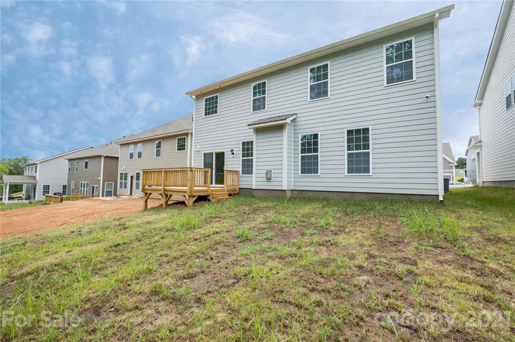 420 Preston Road Mooresville, NC 28117 - Photo 35 of 39 a view of a house with a yard
