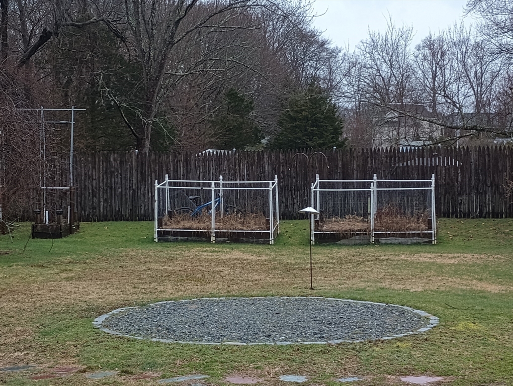 616 County Road Barrington, RI 02806 - Photo 11 of 32 a view of a backyard with wooden fence
