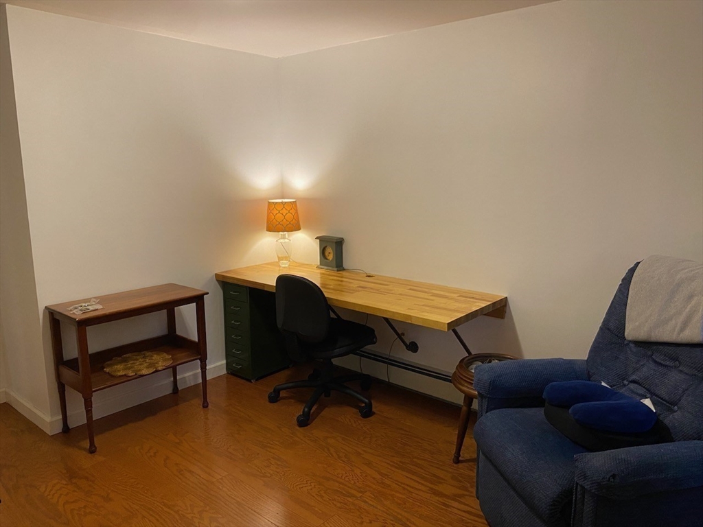 616 County Road Barrington, RI 02806 - Photo 26 of 32 a room with furniture and a wooden floor