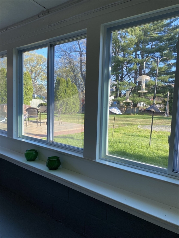 616 County Road Barrington, RI 02806 - Photo 31 of 32 a window in an empty room with wooden floor and windows