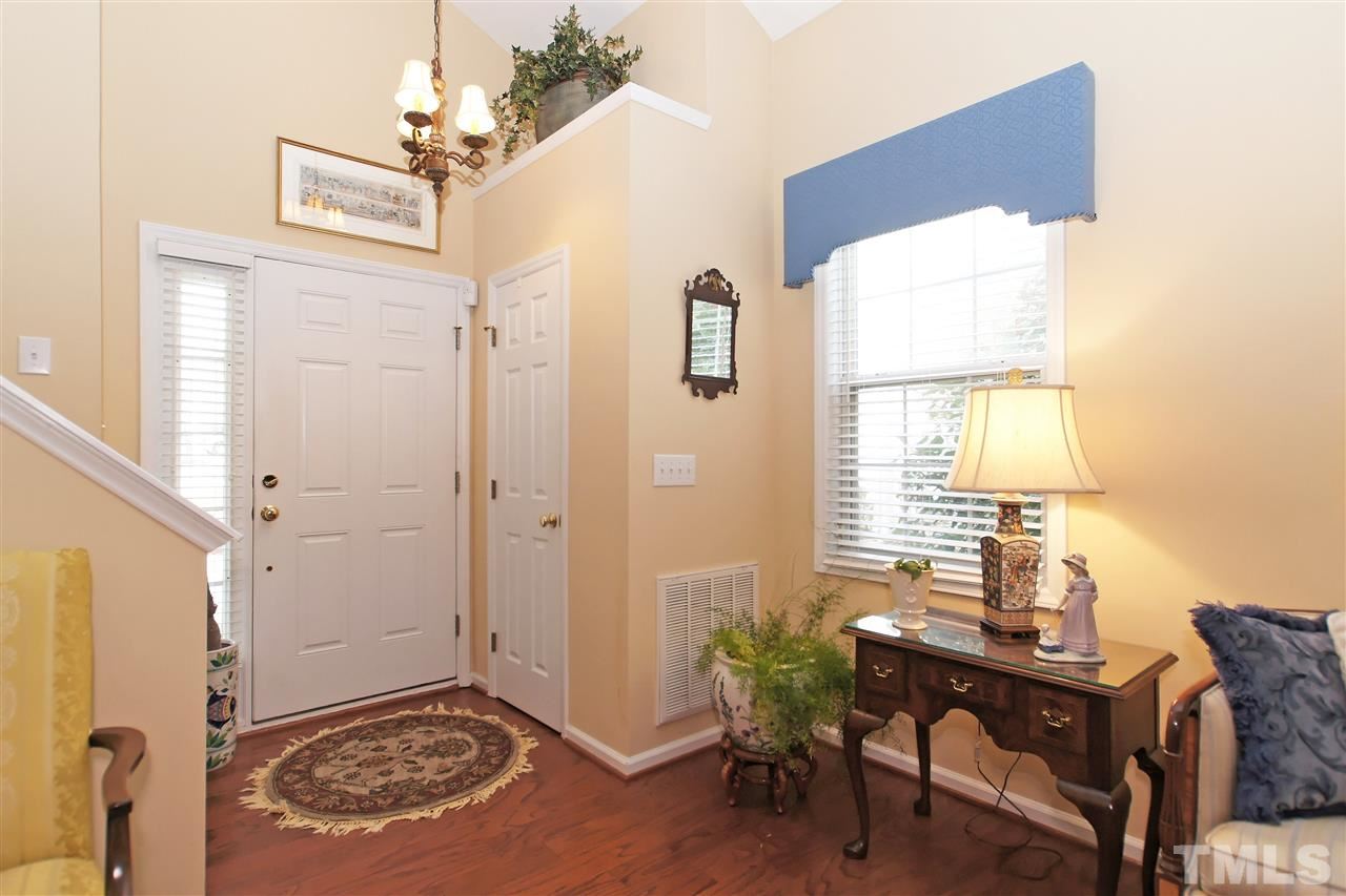 113 Inkster Cove Raleigh, NC 27603 - Photo 3 of 24 a view of a livingroom with furniture and window