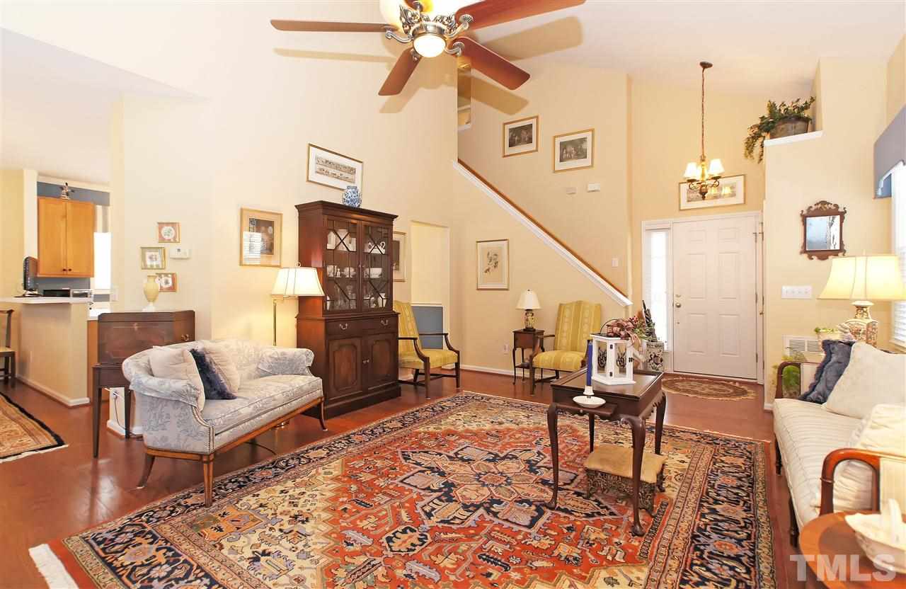 113 Inkster Cove Raleigh, NC 27603 - Photo 6 of 24 a living room with furniture and wooden floor
