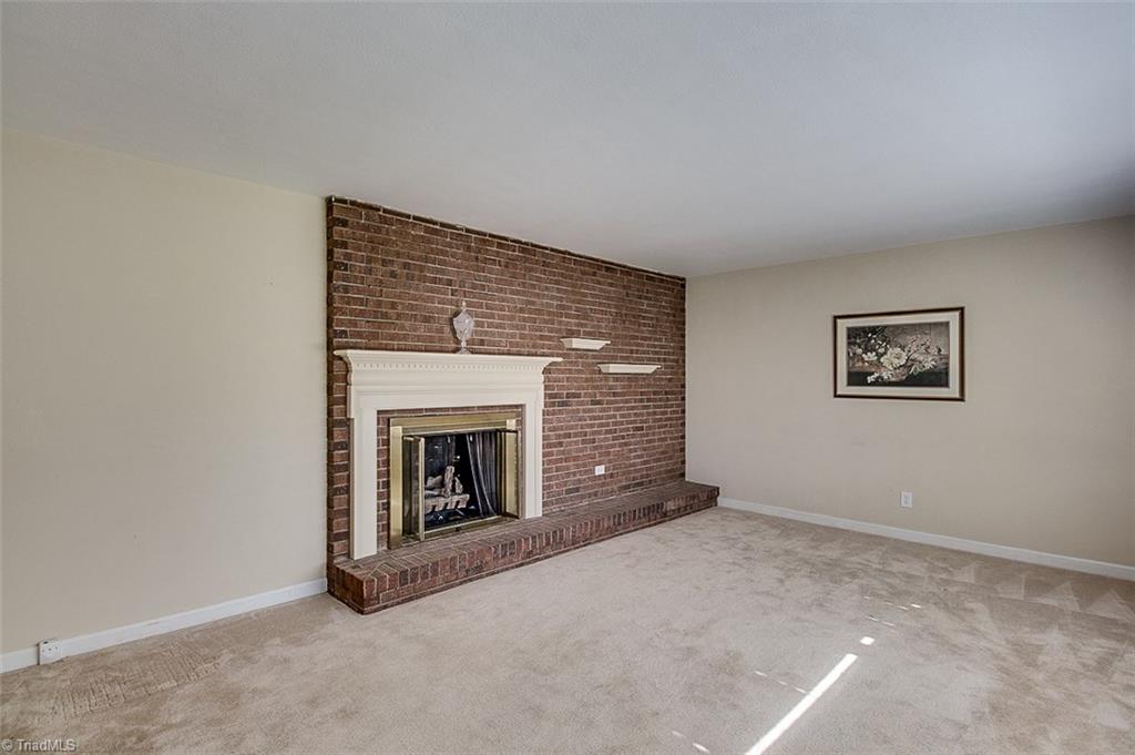 600 Trindale Road Trinity, NC 27370 - Photo 13 of 21 Large Living Room With Beautiful Brick Fireplace With Gas Logs