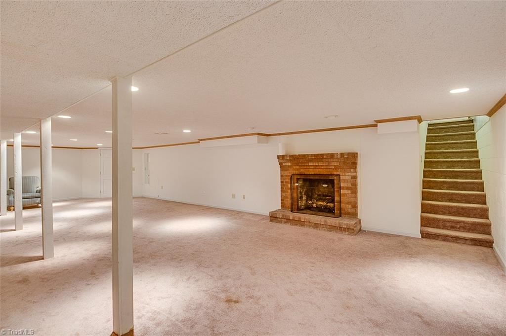 600 Trindale Road Trinity, NC 27370 - Photo 18 of 21 Huge Finished Basement Offers Perfect Teen Space or Potential Mother In Law Suite. Also Brick Fireplace with Gas Logs Perfect for those Cold Nights!