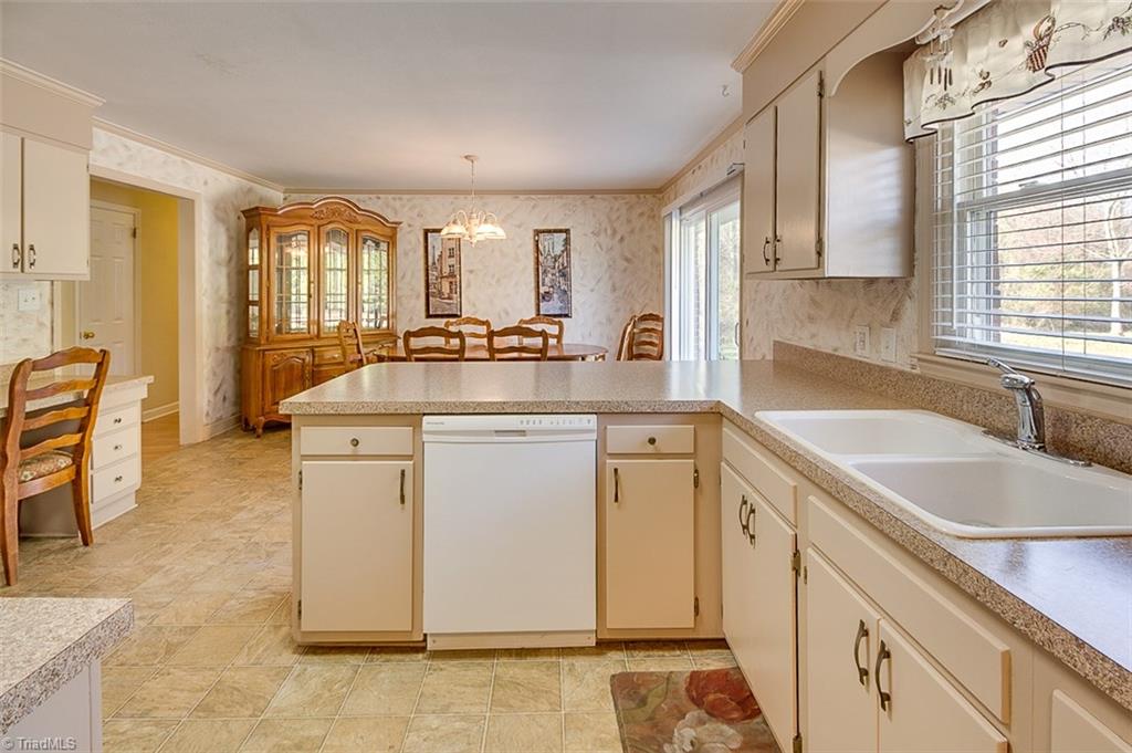 600 Trindale Road Trinity, NC 27370 - Photo 8 of 21 Beautiful Spacious Kitchen Offers Nice Desk Space Perfect For Afternoon Homework or Nice Computer Space!