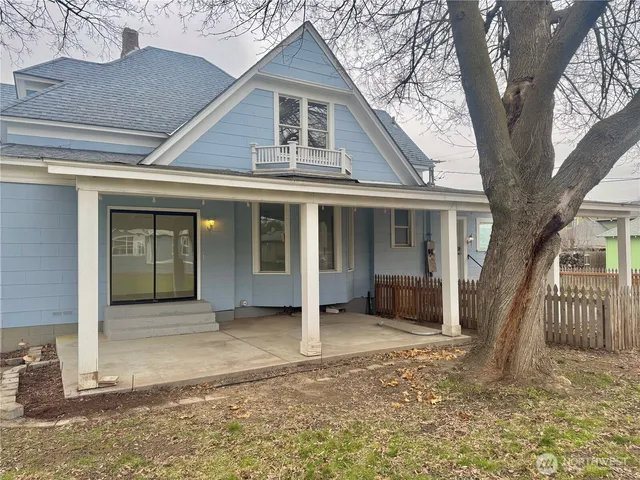 a front view of a house with a porch