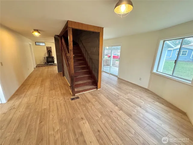 a view of entryway with wooden floor