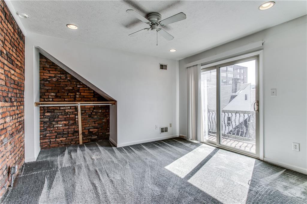 2128 Merriman Way Pittsburgh, PA 15203 - Photo 20 of 37 an empty room with wooden floor and windows