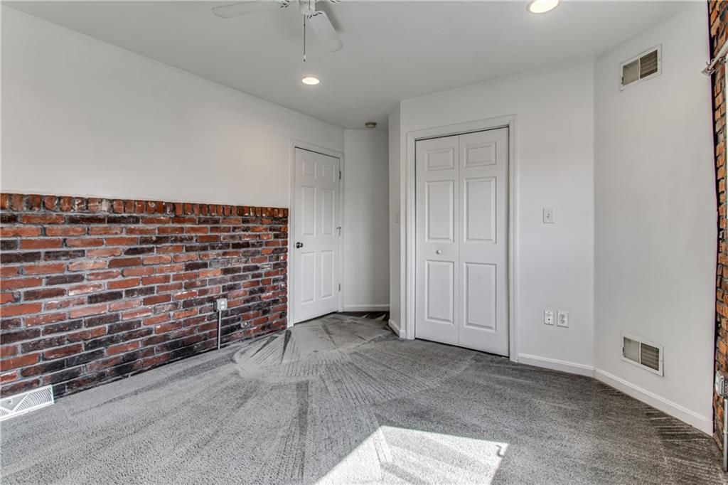 2128 Merriman Way Pittsburgh, PA 15203 - Photo 21 of 37 a view of an empty room with wooden floor and a window