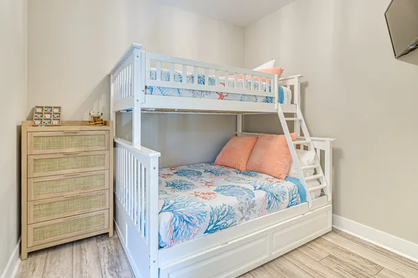 a bedroom with a bed and storage