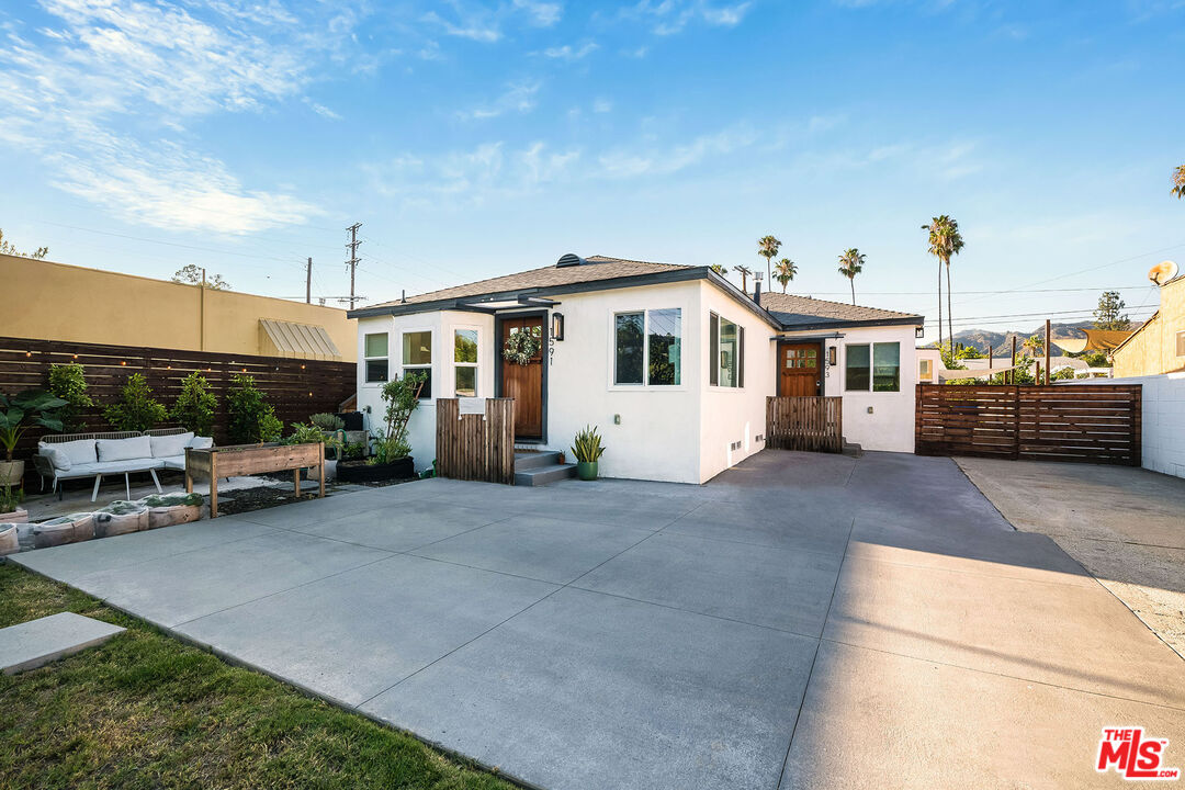1591 Yosemite Drive Los Angeles, CA 90041 - Photo 2 of 16 a view of a white house with a patio