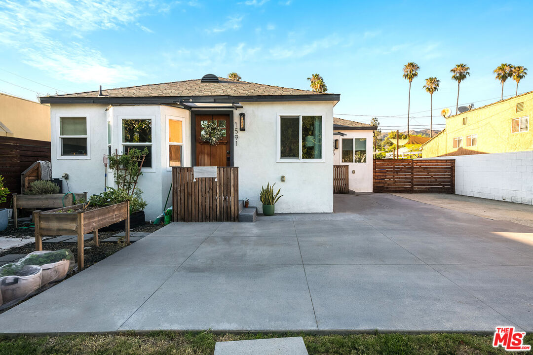 1591 Yosemite Drive Los Angeles, CA 90041 - Photo 6 of 16 a view of a house with a patio
