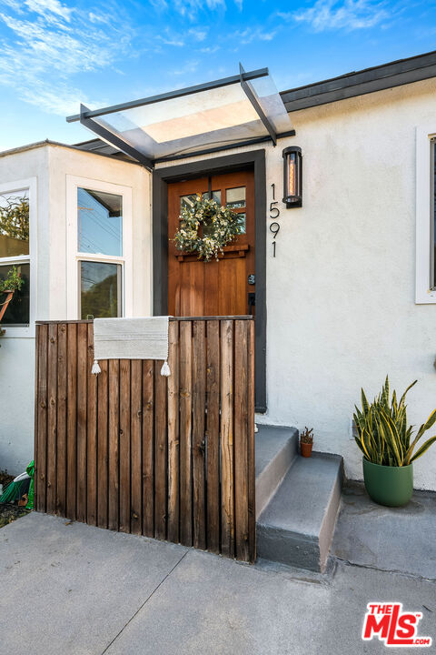 1591 Yosemite Drive Los Angeles, CA 90041 - Photo 7 of 16 a view of a front door and porch