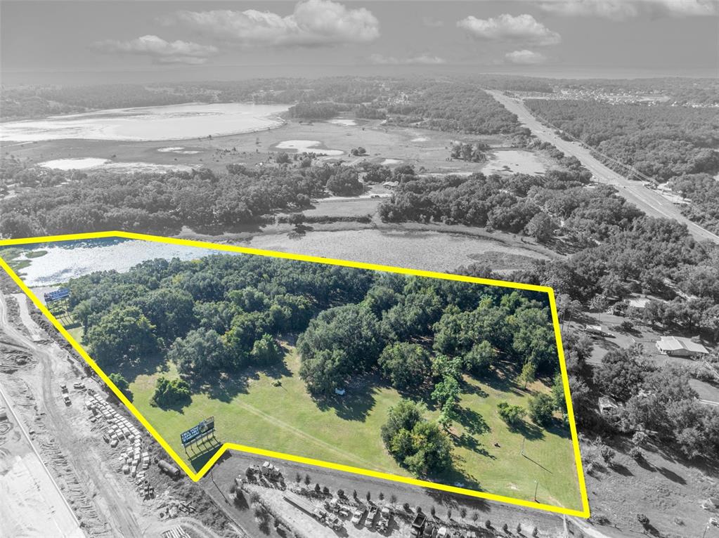 a view of a yard with an outdoor seating