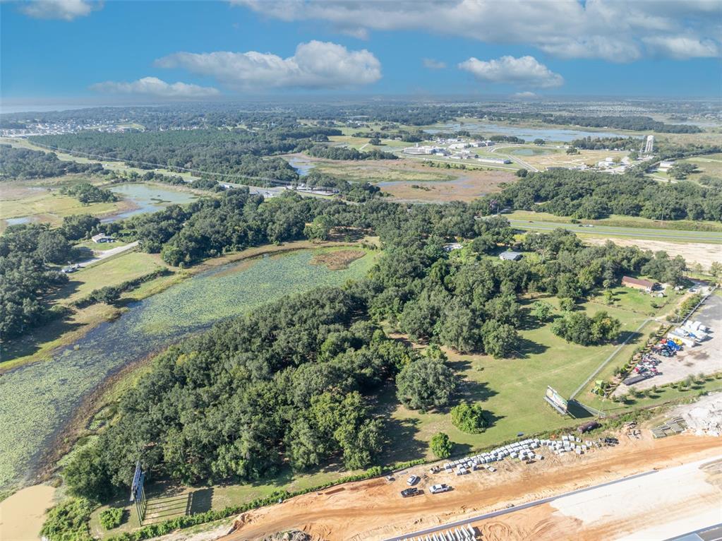 19048 Causey Road Clermont, FL 34715 - Photo 11 of 36 a view of a lake with a mountain