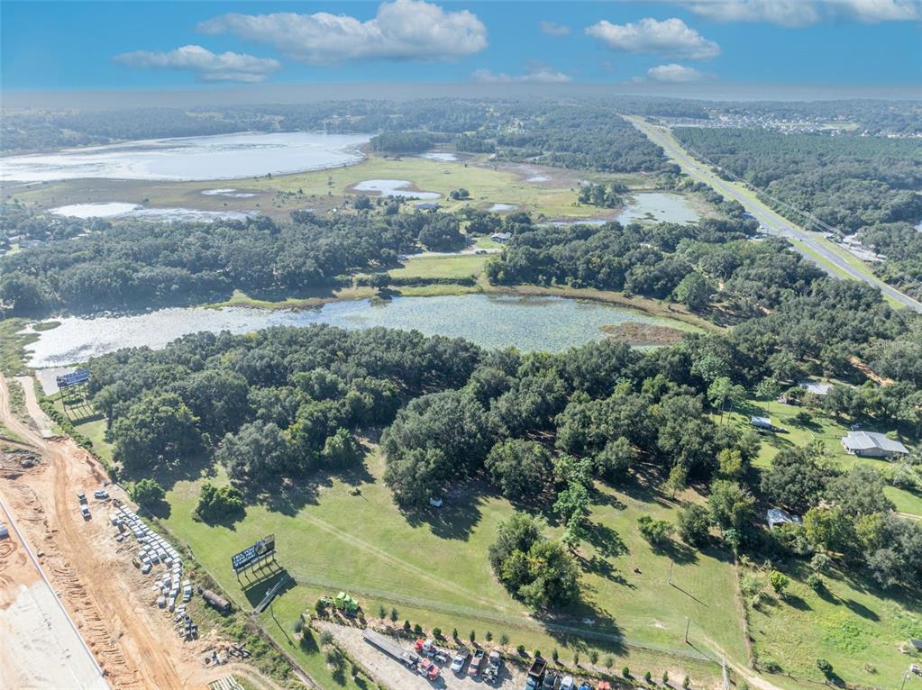 19048 Causey Road Clermont, FL 34715 - Photo 13 of 36 a view of a yard with an outdoor space