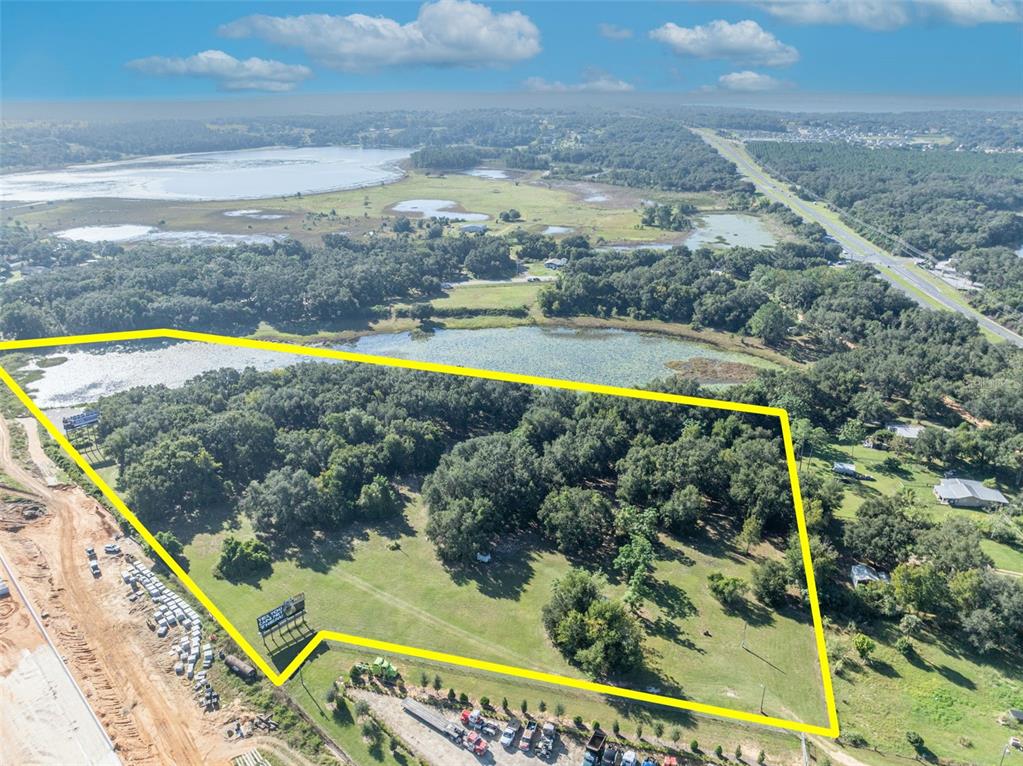 19048 Causey Road Clermont, FL 34715 - Photo 2 of 36 a view of swimming pool with a yard