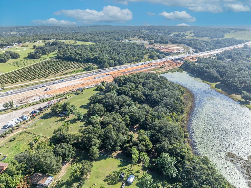 19048 Causey Road Clermont, FL 34715 - Photo 21 of 36 a view of a yard with an outdoor space