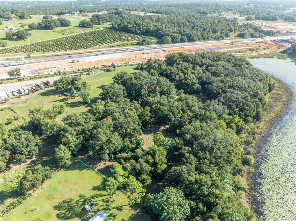 19048 Causey Road Clermont, FL 34715 - Photo 22 of 36 a view of an outdoor space and a lake view