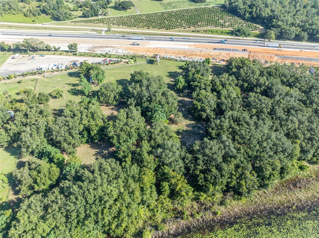19048 Causey Road Clermont, FL 34715 - Photo 23 of 36 a view of a lush green field
