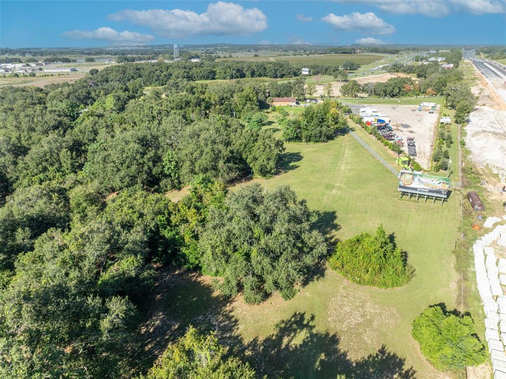 19048 Causey Road Clermont, FL 34715 - Photo 25 of 36 a view of a lake with a mountain
