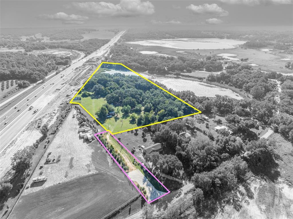 19048 Causey Road Clermont, FL 34715 - Photo 31 of 36 a view of a back yard of the house