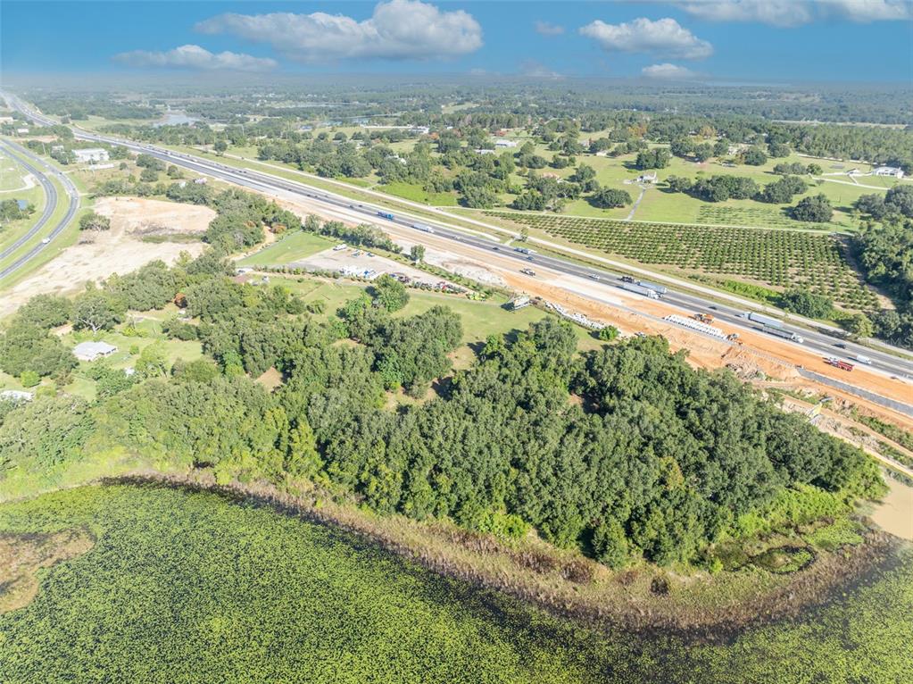 19048 Causey Road Clermont, FL 34715 - Photo 9 of 36 a view of an outdoor space and a lake view