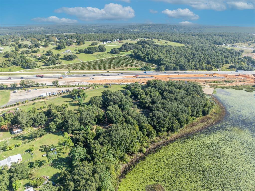 19048 Causey Road Clermont, FL 34715 - Photo 10 of 36 a view of an outdoor space and a lake view