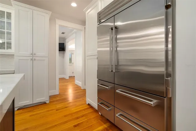 a white bath tub sitting in a bathroom
