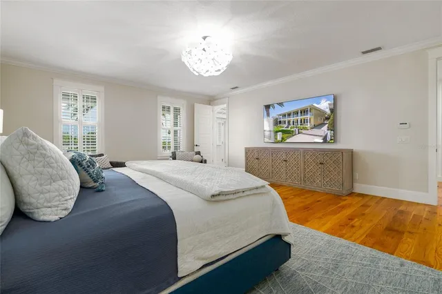 a bathroom with a granite countertop sink a toilet a mirror and shower