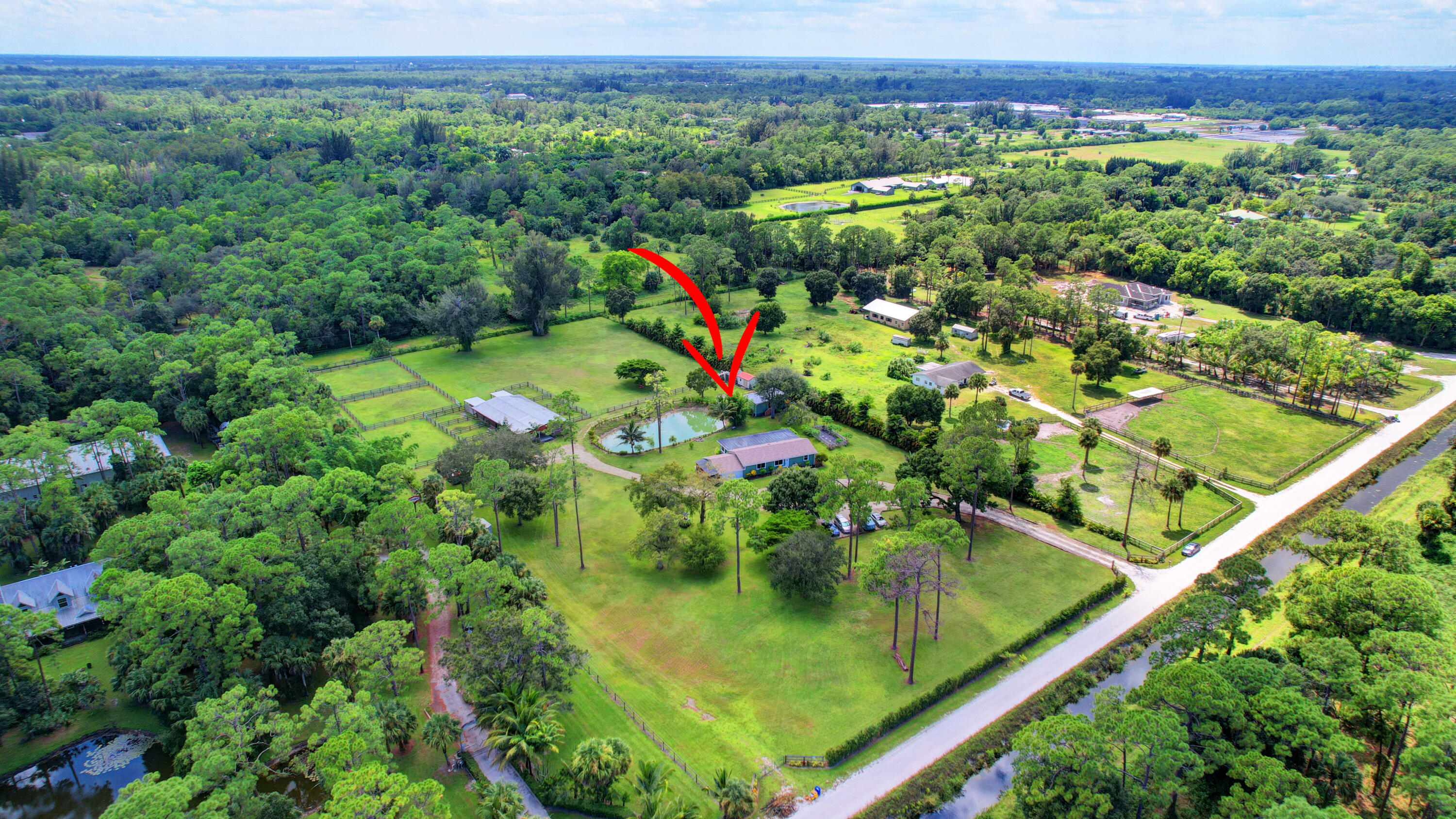 13598 N Road Loxahatchee Groves, FL 33470 - Photo 10 of 87 10_house air (10)