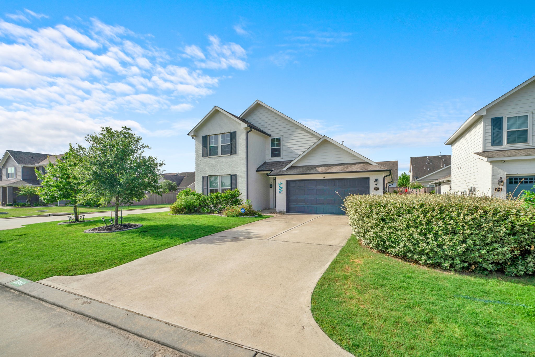 2503 Hagerman Road Conroe, TX 77384 - Photo 1 of 43 This charming two-story home features a clean, modern exterior with a well-maintained lawn and a spacious driveway leading to a two-car garage. Located in a peaceful neighborhood, it offers attractive curb appeal and a welcoming atmosphere.