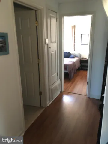 a view of hallway with washer and dryer