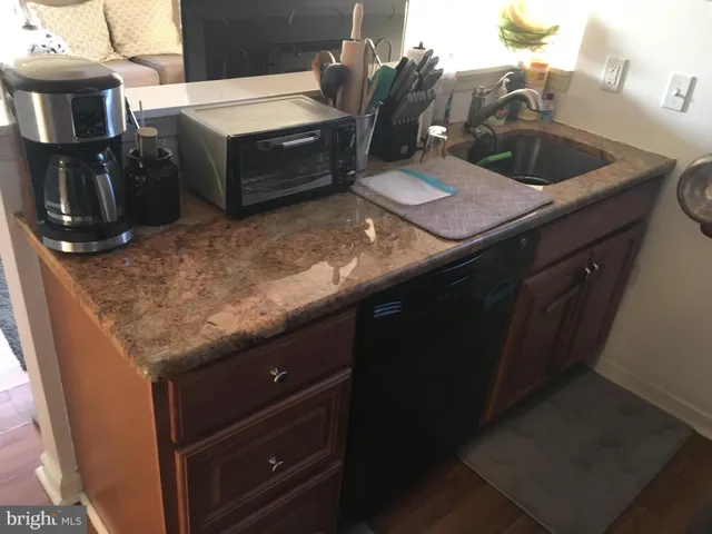 a view of a livingroom with furniture