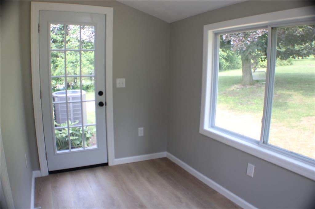 135 Truver Road Valencia, PA 16059 - Photo 8 of 36 The breakfast nook has brand new flooring and fresh paint. It leads out to the spacious back yard.