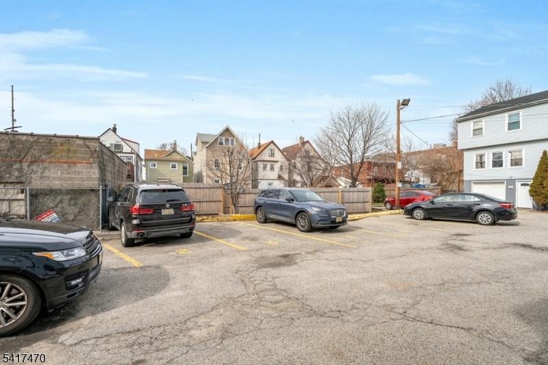 13 Allen Street Passaic, NJ 07055 - Photo 7 of 7 a view of cars parked in a parking lot