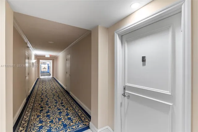 a living room with gym equipment and a large window