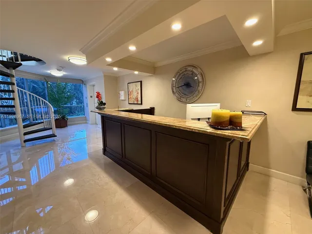 a view of a lake with tall buildings