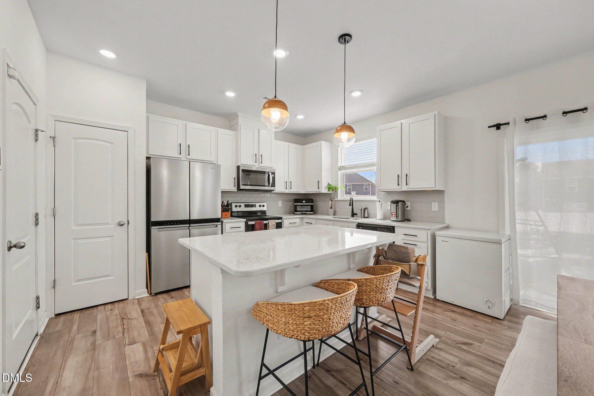2129 Crestwood Rdg Drive Durham, NC 27704 - Photo 7 of 27 Kitchen Island
