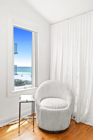 a living room with a couch and a chair