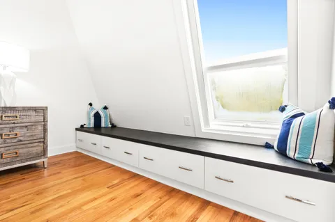 a kitchen with granite countertop a refrigerator and a stove