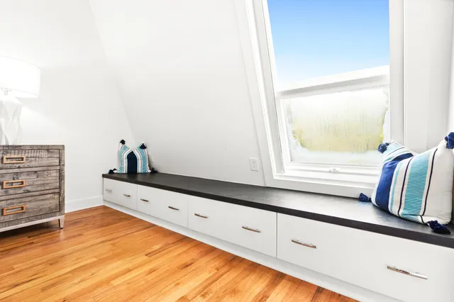 a kitchen with granite countertop a refrigerator and a stove