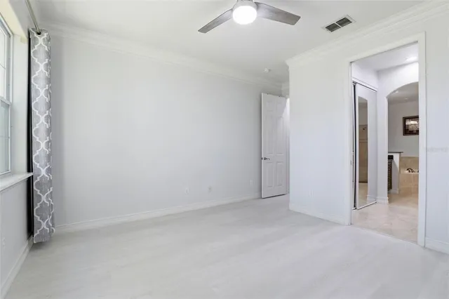 view of a bathroom with a glass shower door