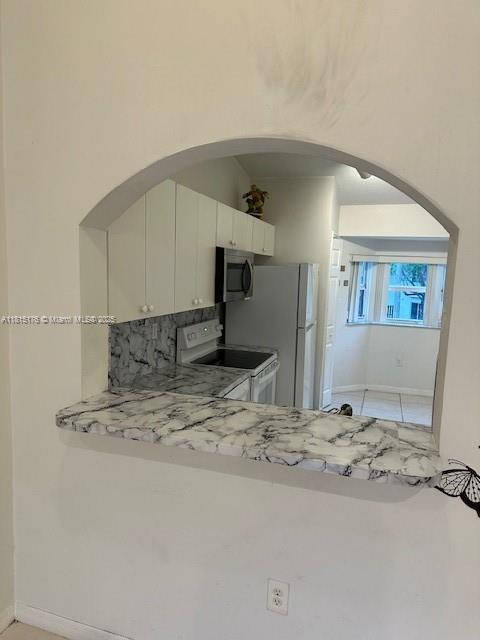 Homestead Homestead, FL 33035 - Photo 6 of 14 a view of a kitchen with kitchen island sink and refrigerator