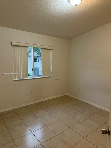 a bathroom with a bathtub toilet and sink