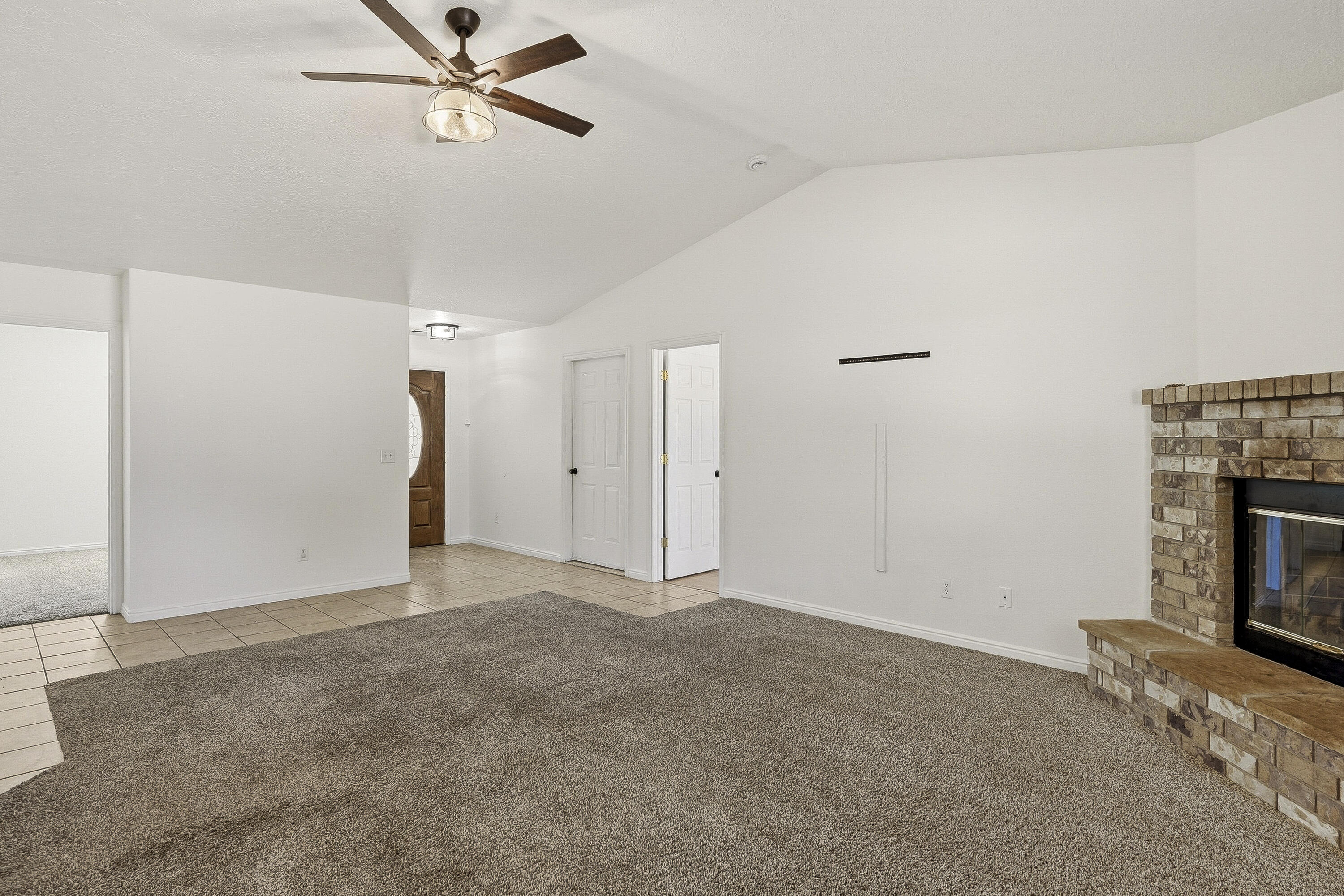 4510 North Half Mile Road Cedar City, UT 84721 - Photo 7 of 48 Vaulted ceilings add to the open feel of this space.