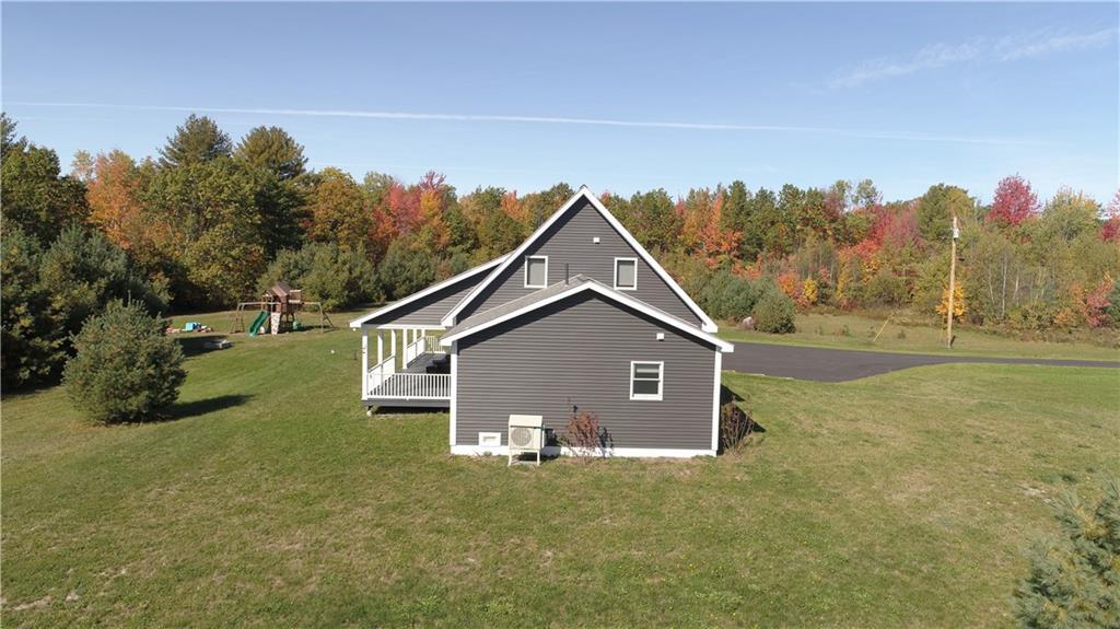 491 Ridge Road Plymouth, ME 04969 - Photo 27 of 35 Side View of Home