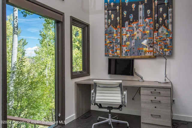 a view of cabinets and window