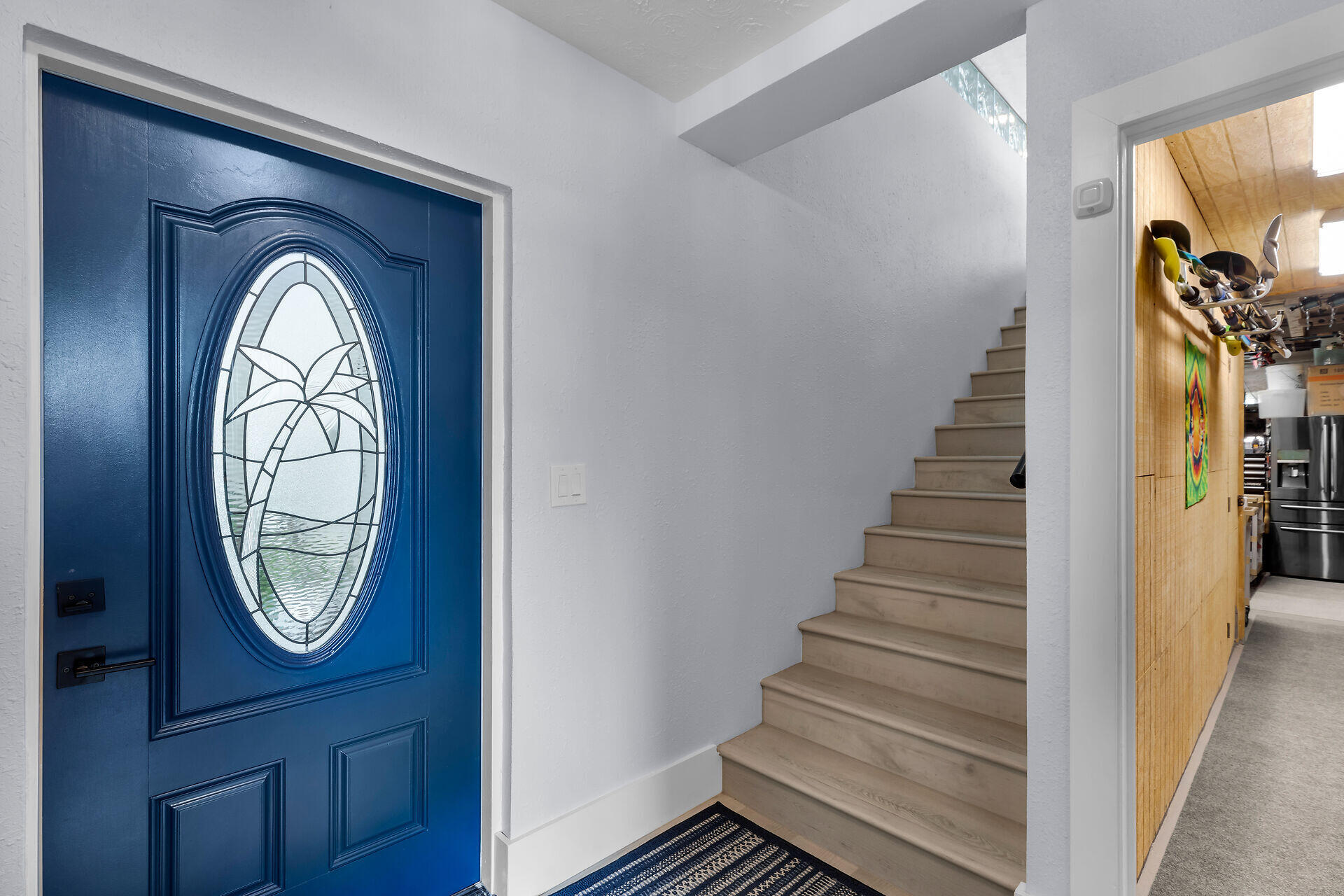 30363 Flamingo Lane Big Pine Key, FL 33043 - Photo 12 of 43 a view of wooden floor with a large window and stairs