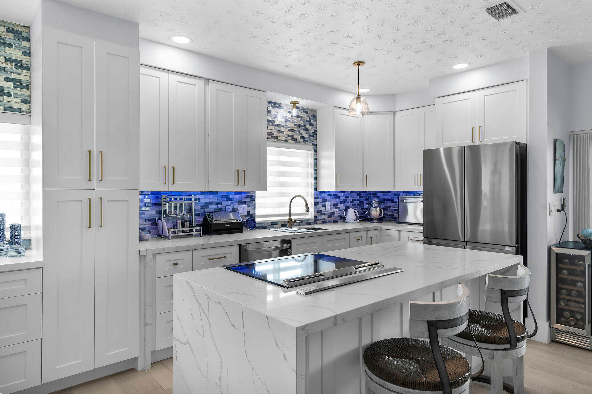 30363 Flamingo Lane Big Pine Key, FL 33043 - Photo 15 of 43 a kitchen with stainless steel appliances a sink and a refrigerator